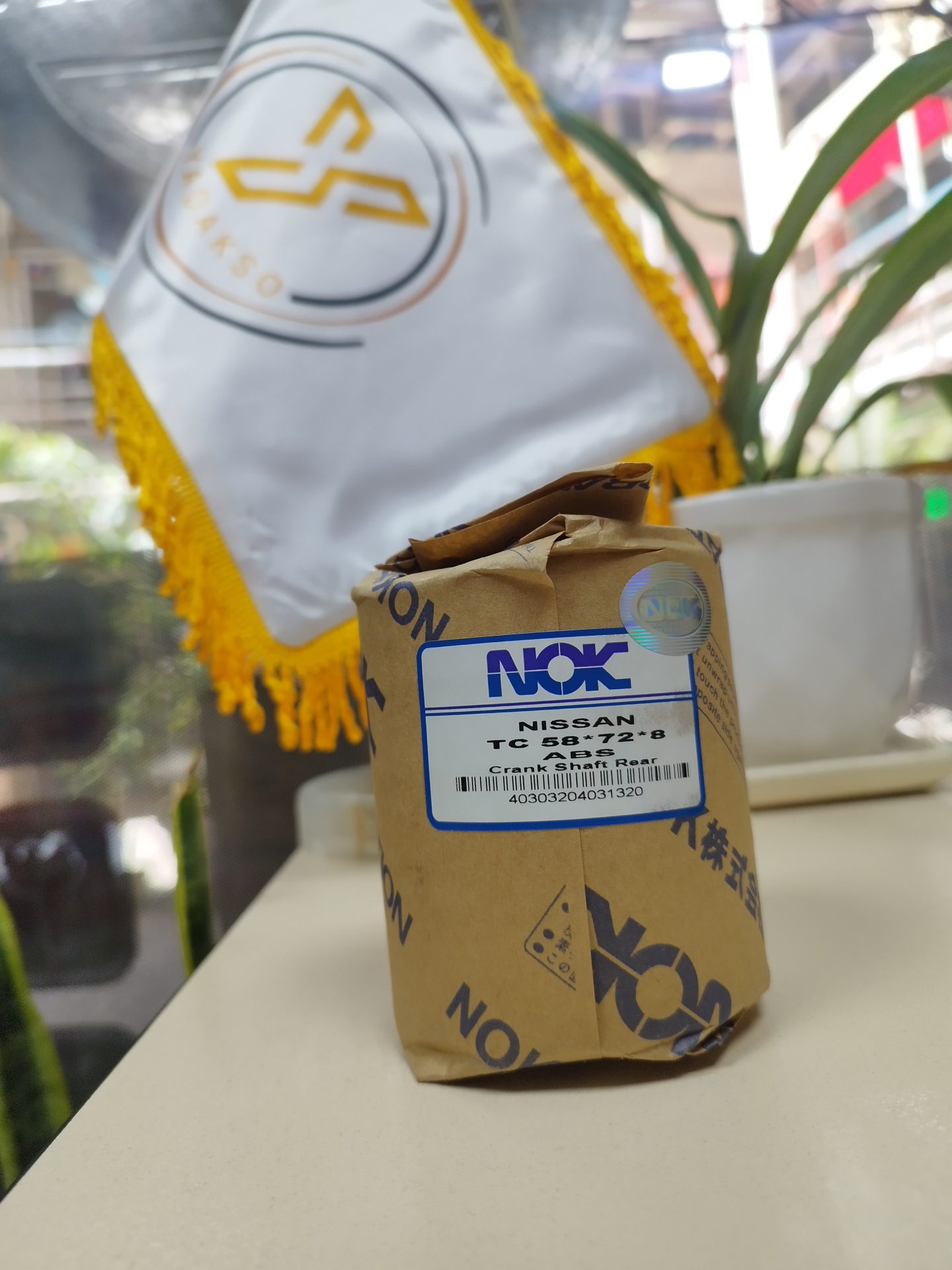 کاسه نمد چرخ جلو ABS نیسان وانت NOK