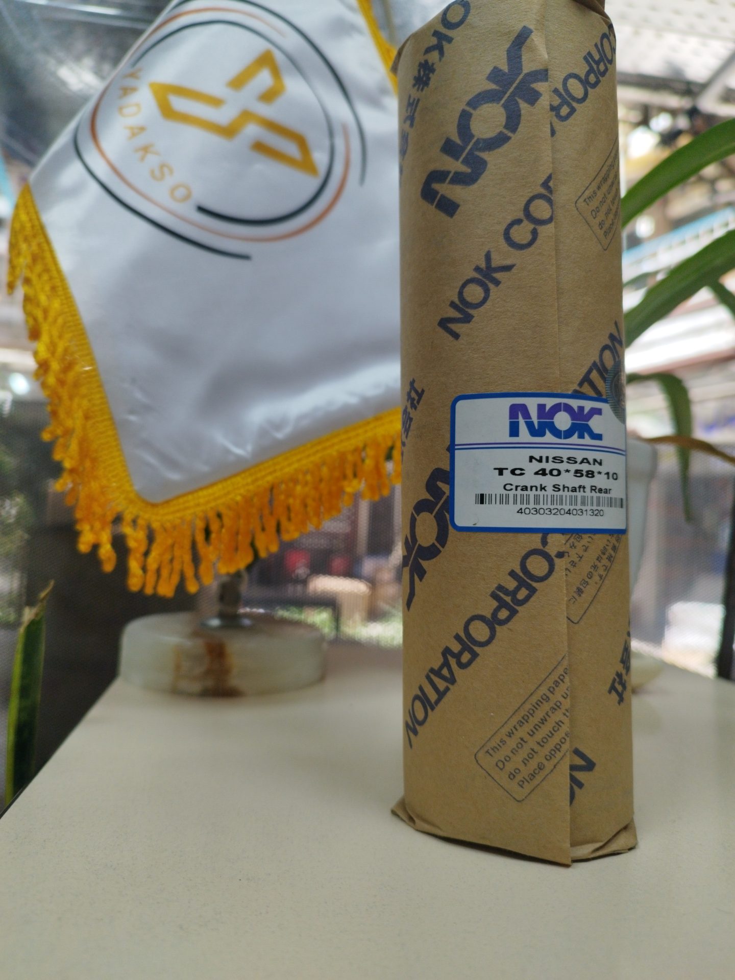 کاسه نمد چرخ جلو نیسان NOK